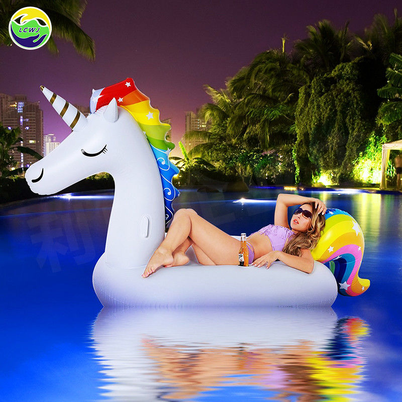 Venta directa de la fábrica de China Lago agua gran caramelo inflable Unicornio flotador de playa