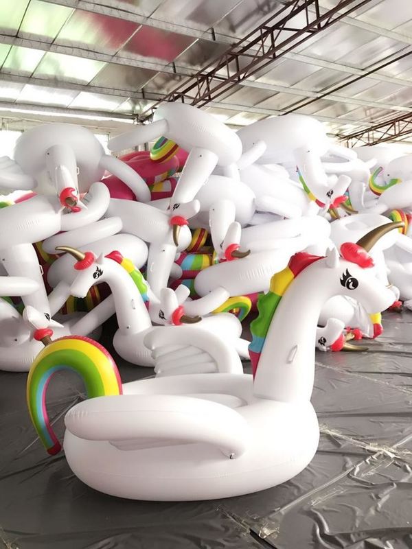 OEM Rideable Float piscina inflable paseo en la piscina de unicornio inflable juguete salón