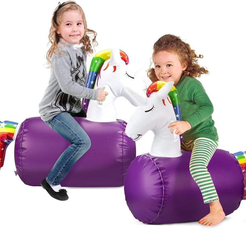 Unicornio y Dino saltando juguetes hinchables montar en el salpicador caballo saltador para el rendimiento